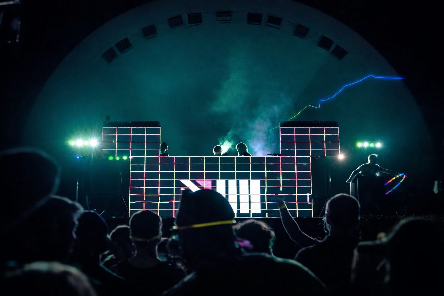 viii logo on stage with audience